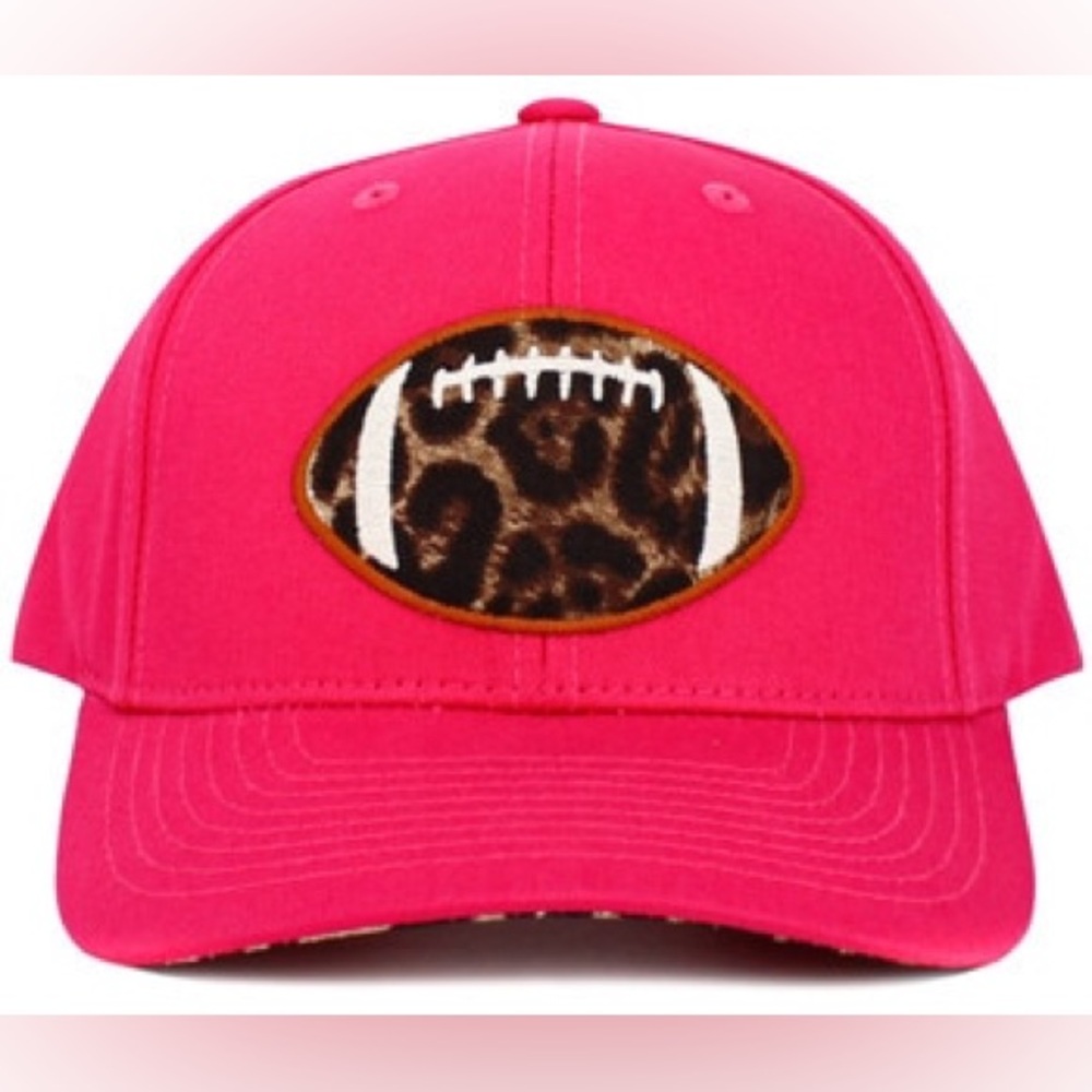 Hot pink ball cap with football appliqué